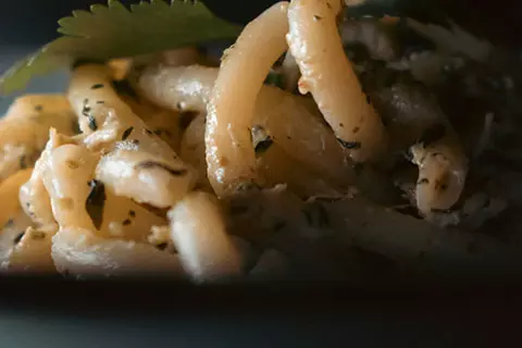 Short pasta in a creamy herb sauce
